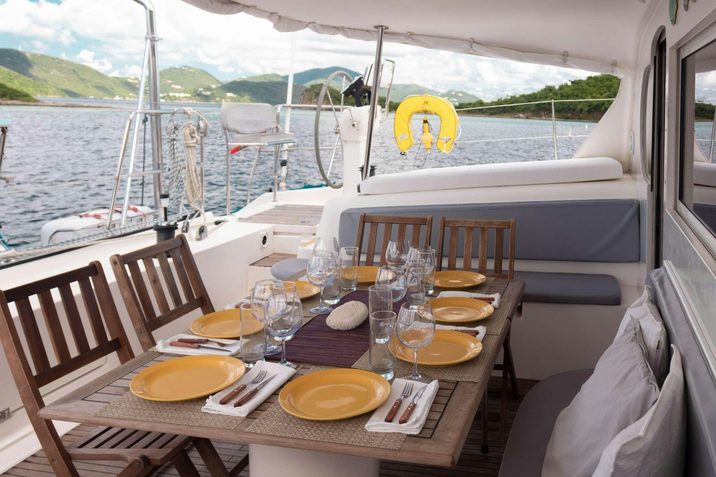 a table with food on it aboard NEMO Yacht for Charter