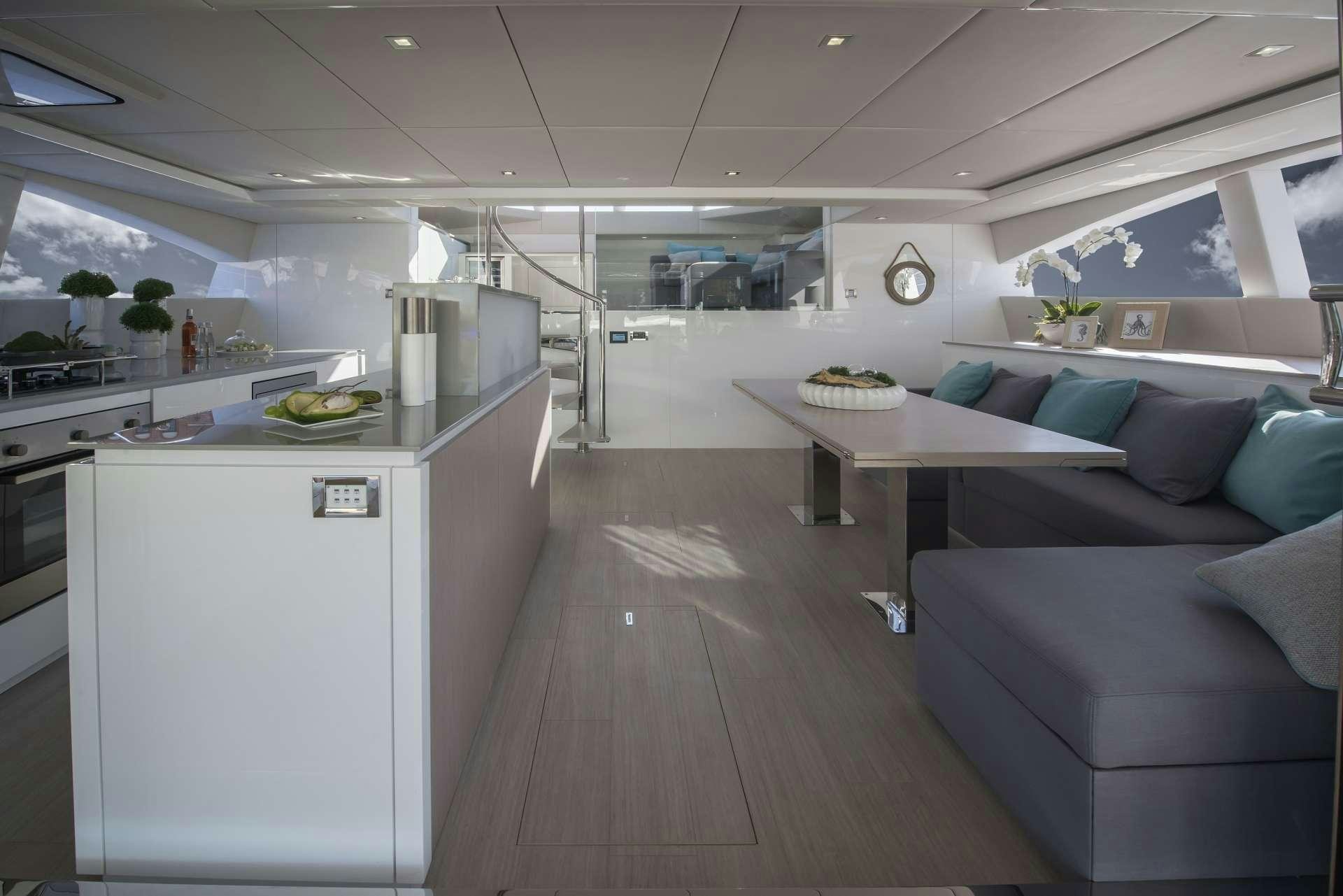 a kitchen and living room aboard MOONDANCE Yacht for Charter