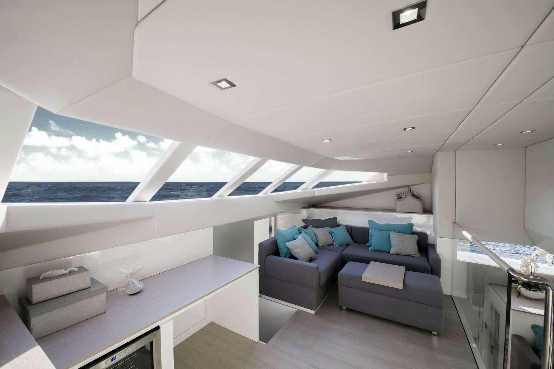a room with a couch and a table aboard MOONDANCE Yacht for Charter