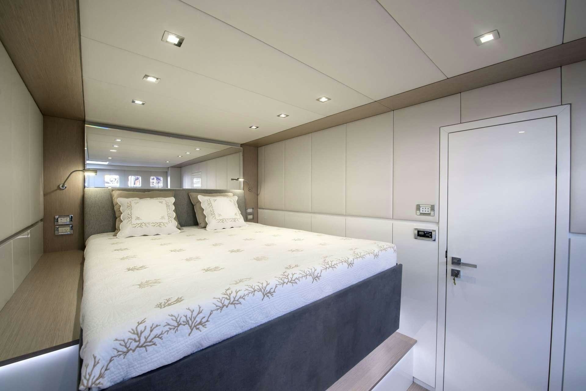 a bed in a room aboard MOONDANCE Yacht for Charter