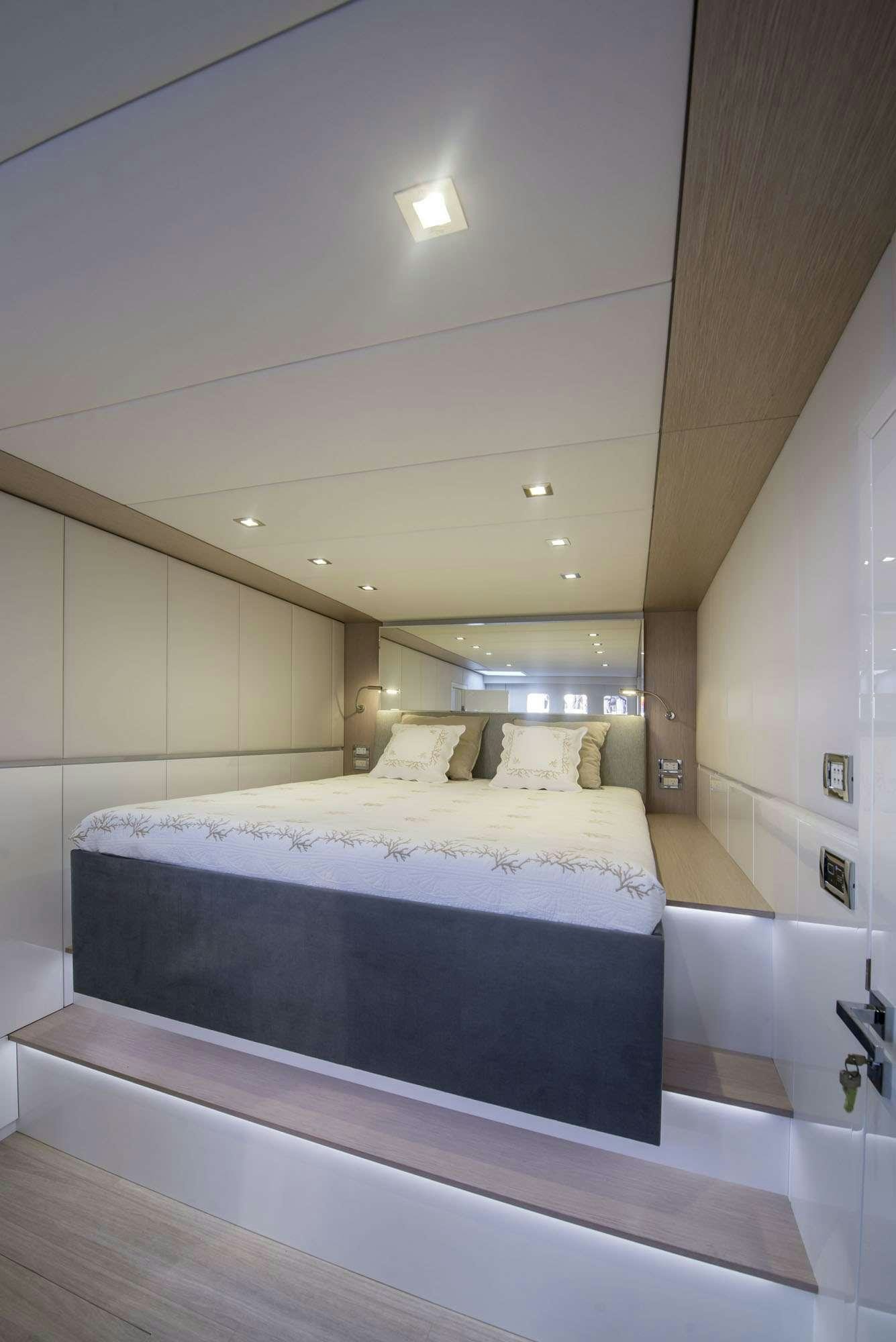 a bed in a room aboard MOONDANCE Yacht for Charter