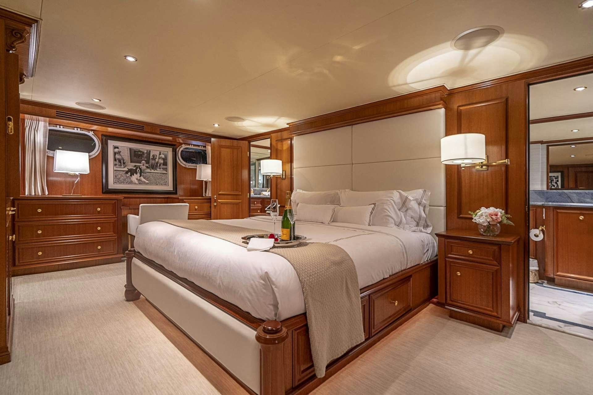 a large bedroom with a large bed aboard TRUE NORTH Yacht for Charter