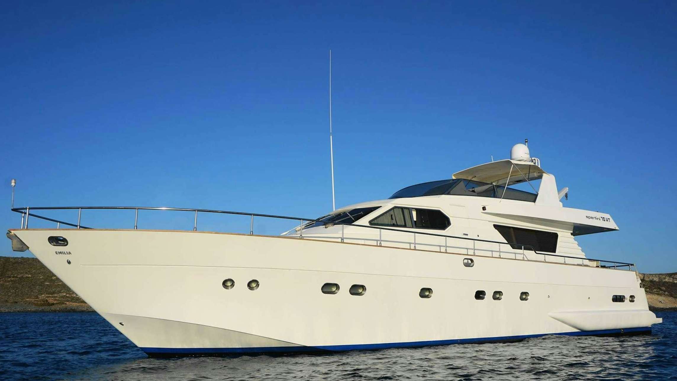 a white yacht on the water aboard EMILIA Yacht for Charter