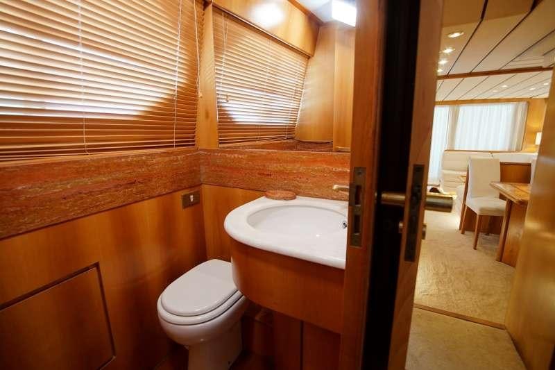 a bathroom with a sink and toilet aboard EMILIA Yacht for Charter