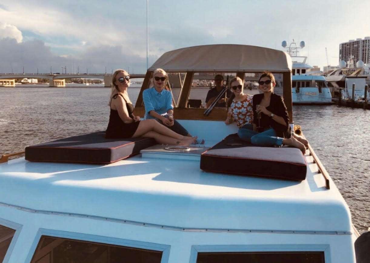 a group of people on a boat aboard KINGFISHER Yacht for Charter