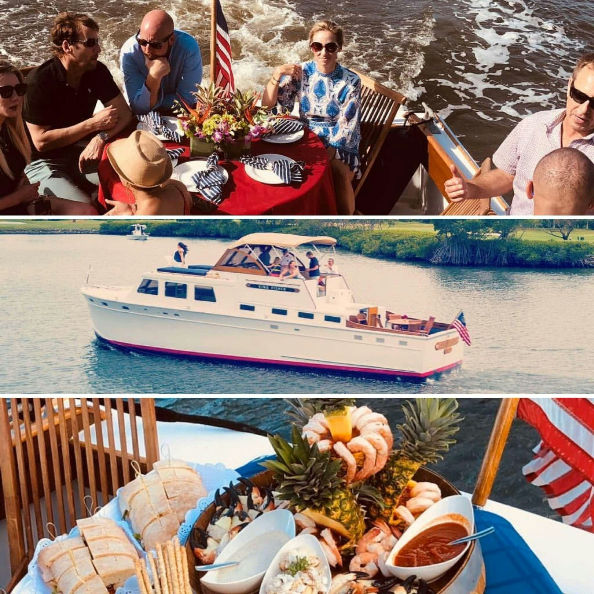 a boat with people on it aboard KINGFISHER Yacht for Charter