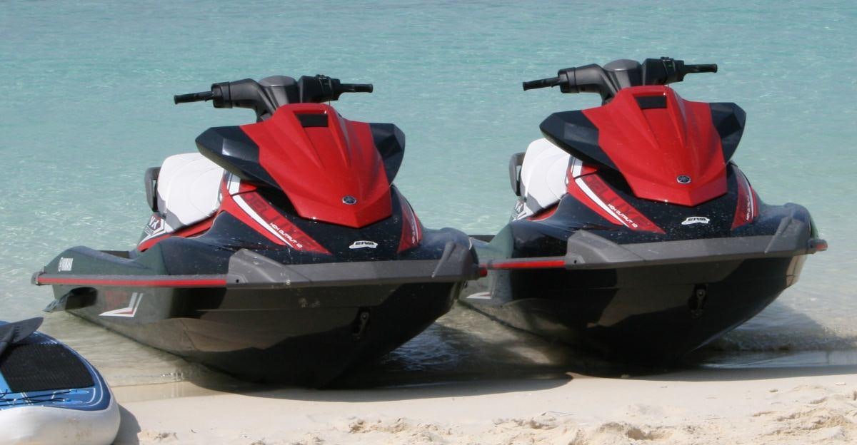 a motorbike on the beach aboard RENAISSANCE Yacht for Charter