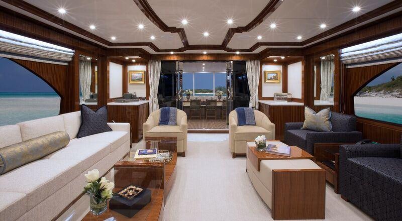 a living room with a large window aboard RENAISSANCE Yacht for Charter