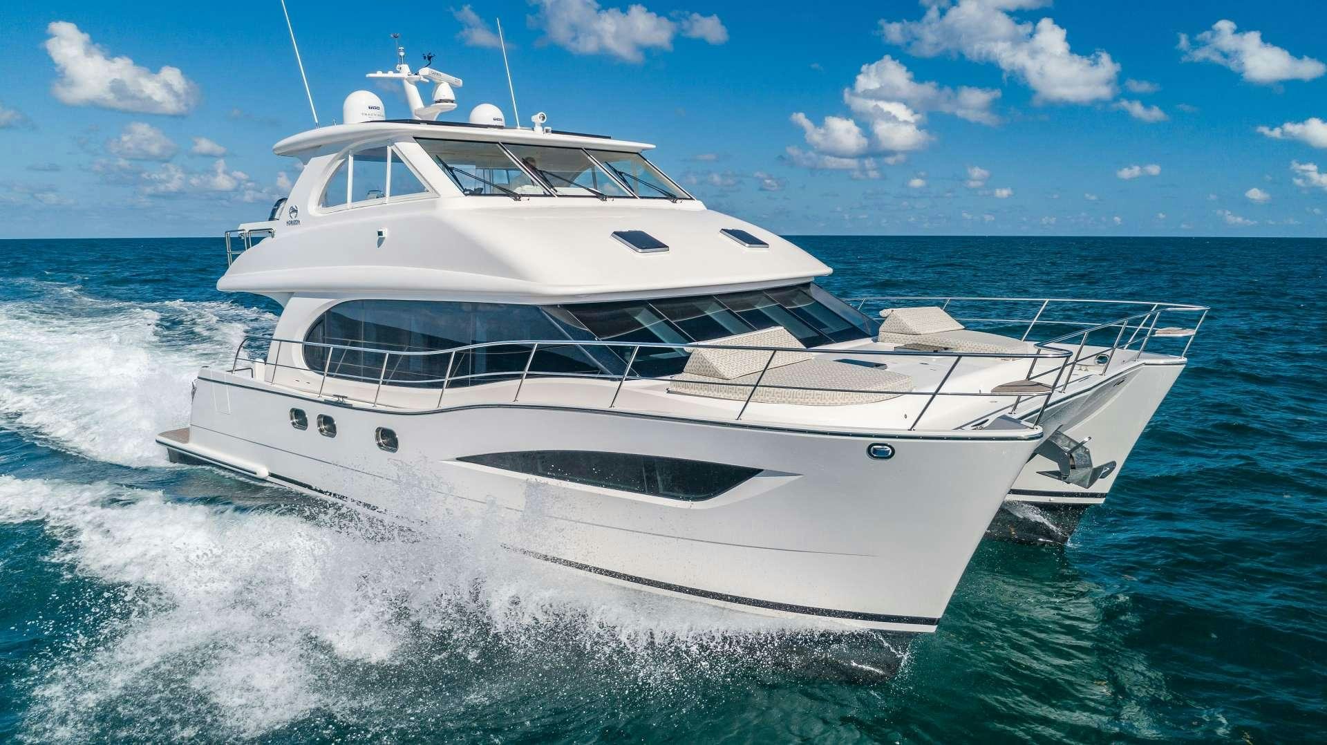a white yacht on the water aboard MYSTIC SOUL Yacht for Charter
