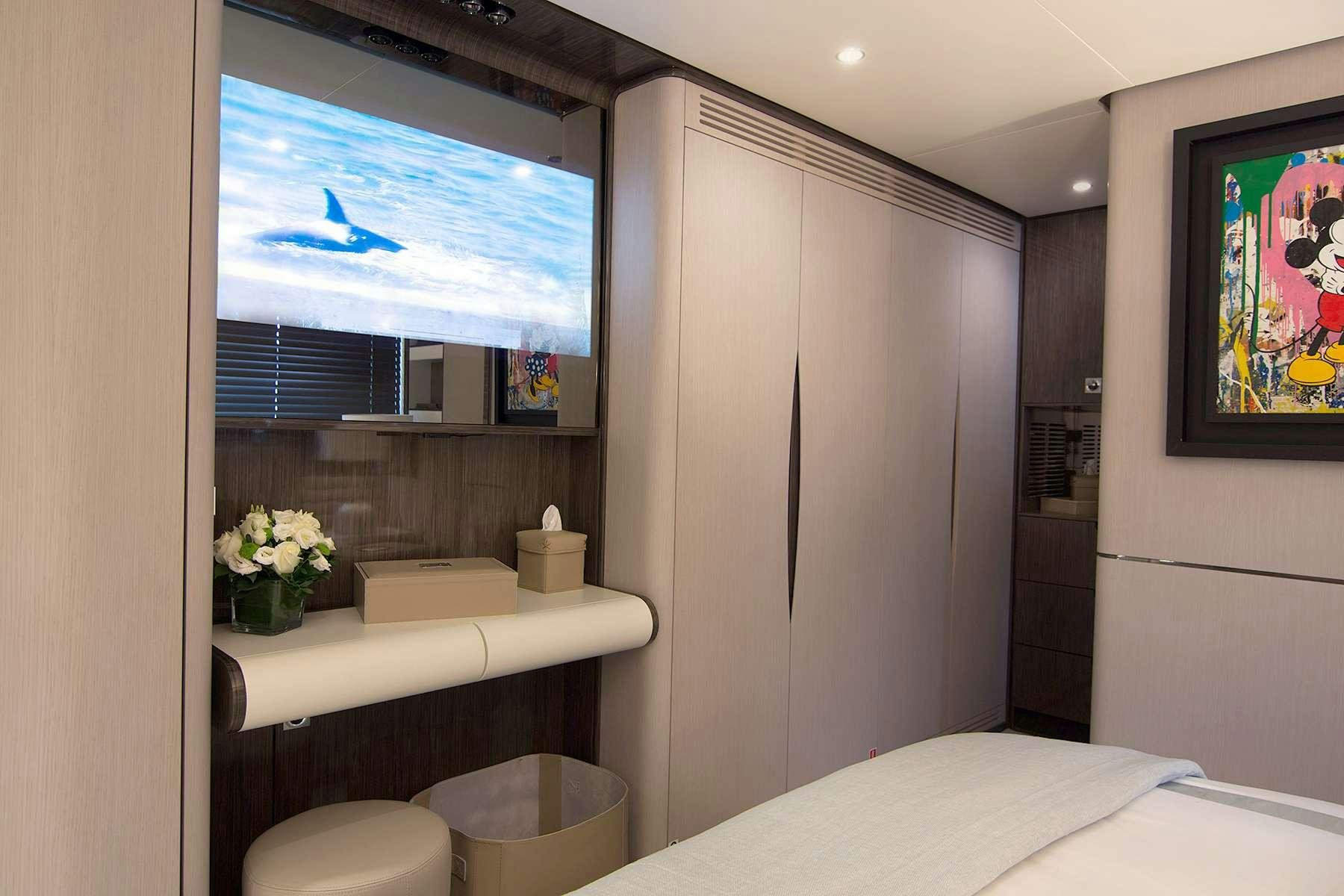 a room with a bed and a window aboard MEMORIES TOO Yacht for Charter