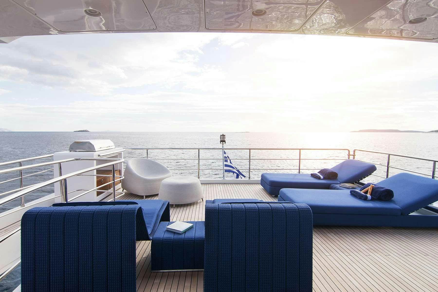 a large balcony overlooking the ocean aboard MEMORIES TOO Yacht for Charter