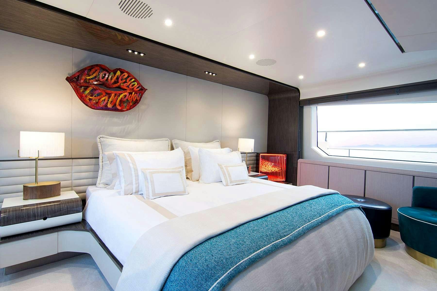 a bed in a room aboard MEMORIES TOO Yacht for Charter