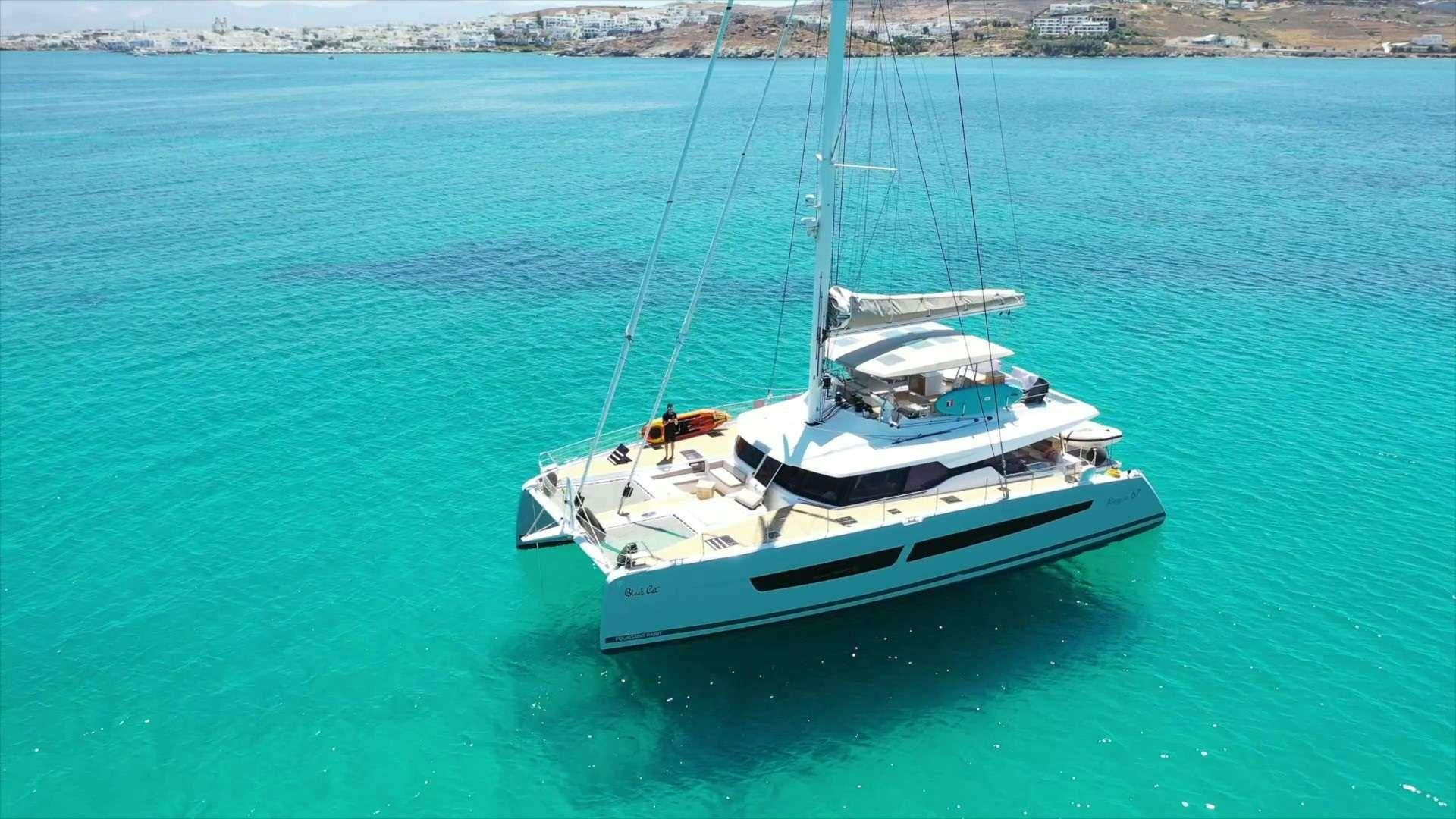 a boat in the water aboard BLACK CAT Yacht for Charter