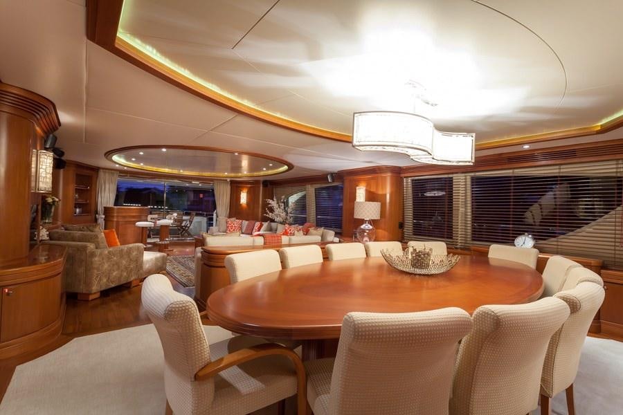 a large living room with a large bar and a large open space aboard HAPPY HOUR Yacht for Charter