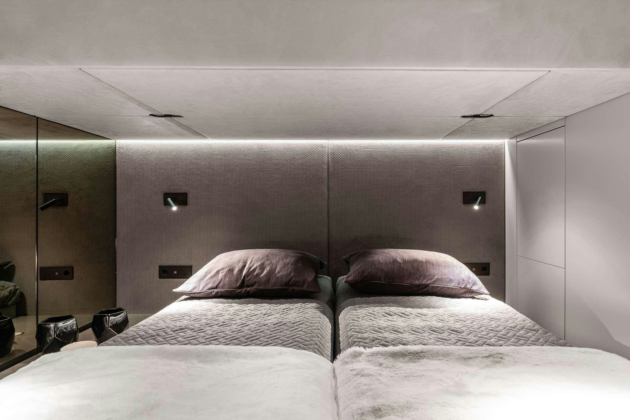 a room with two beds aboard SEIYA Yacht for Charter