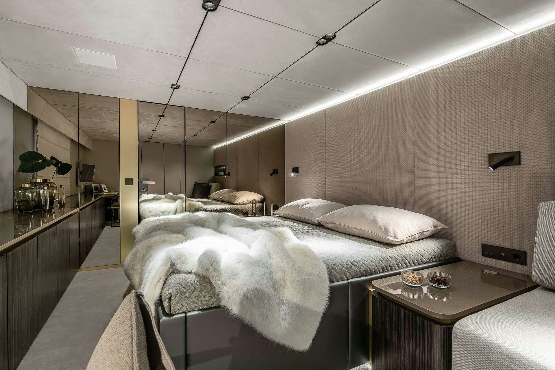 a room with a couple of beds aboard SEIYA Yacht for Charter