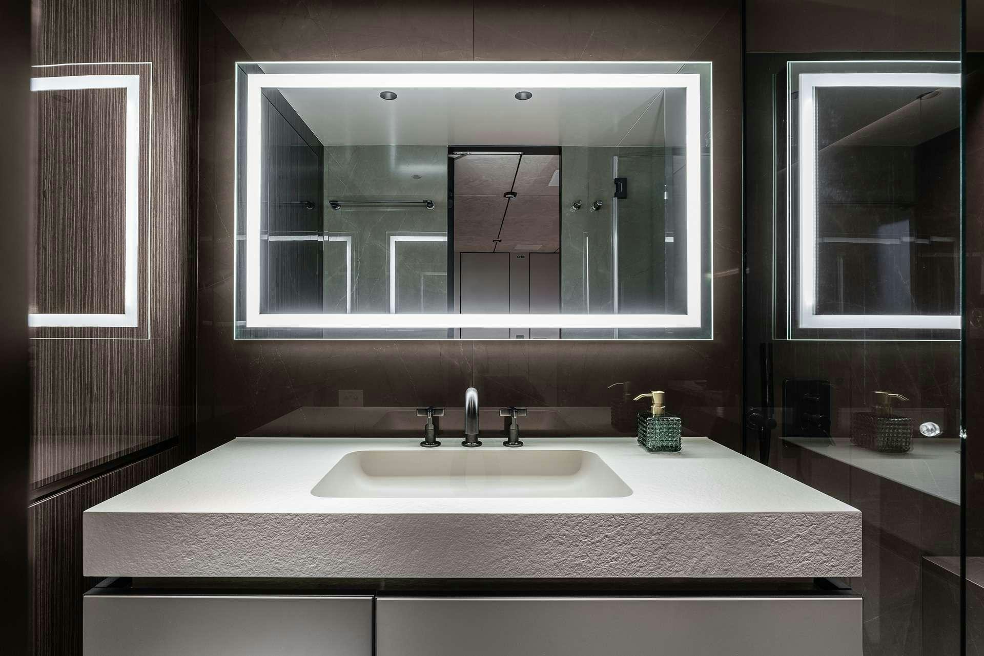 a bathroom with a large mirror aboard SEIYA Yacht for Charter