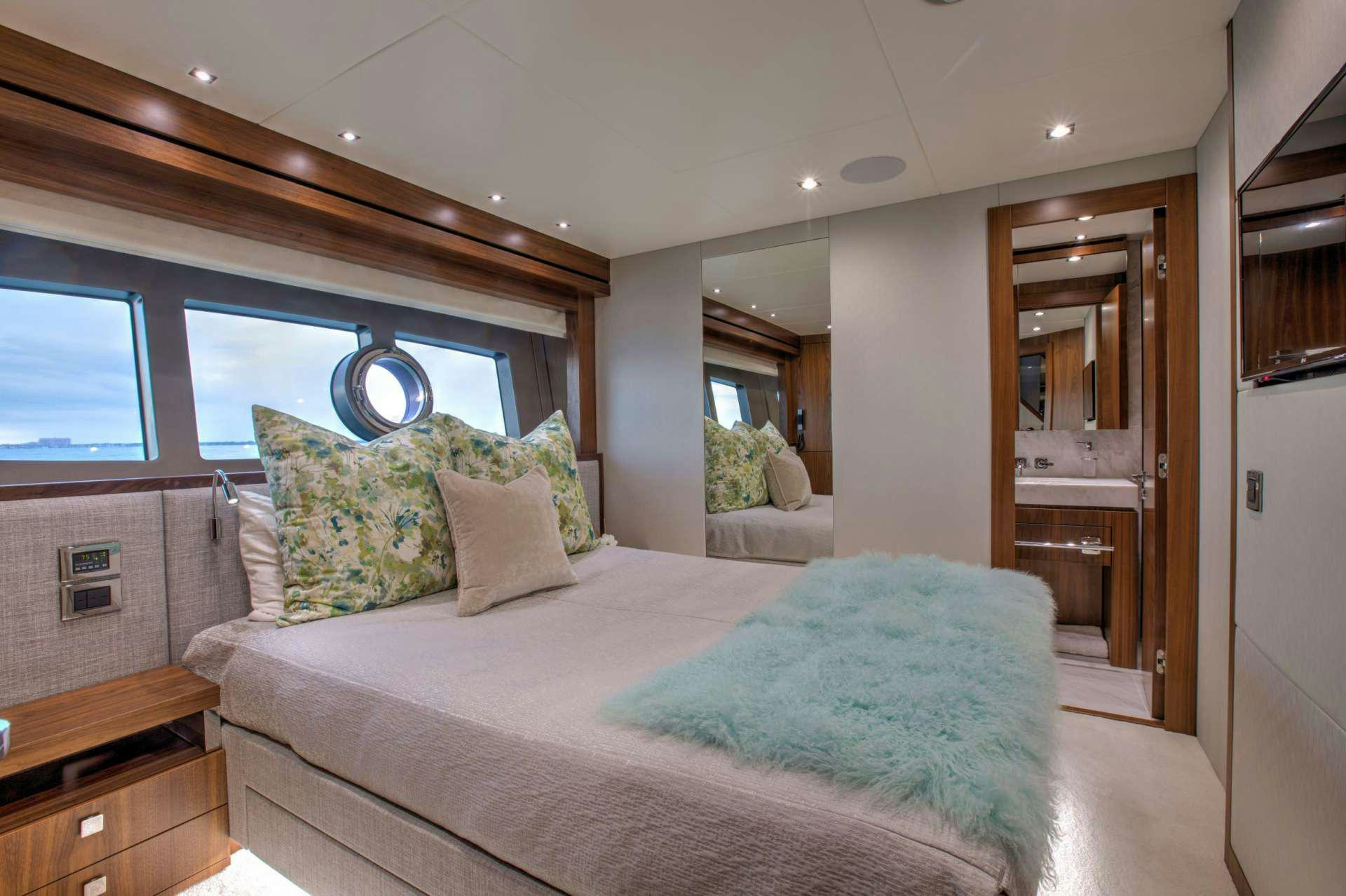 a bed in a room aboard PERSEVERANCE 3 Yacht for Charter