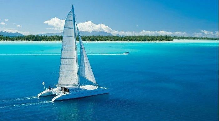 a boat on the water aboard MAGIC CAT Yacht for Charter