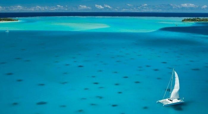 a sailboat in the water aboard MAGIC CAT Yacht for Charter