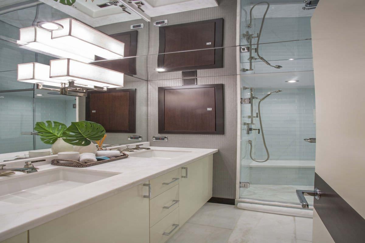 a bathroom with a large tv aboard LADY CARMEN Yacht for Charter