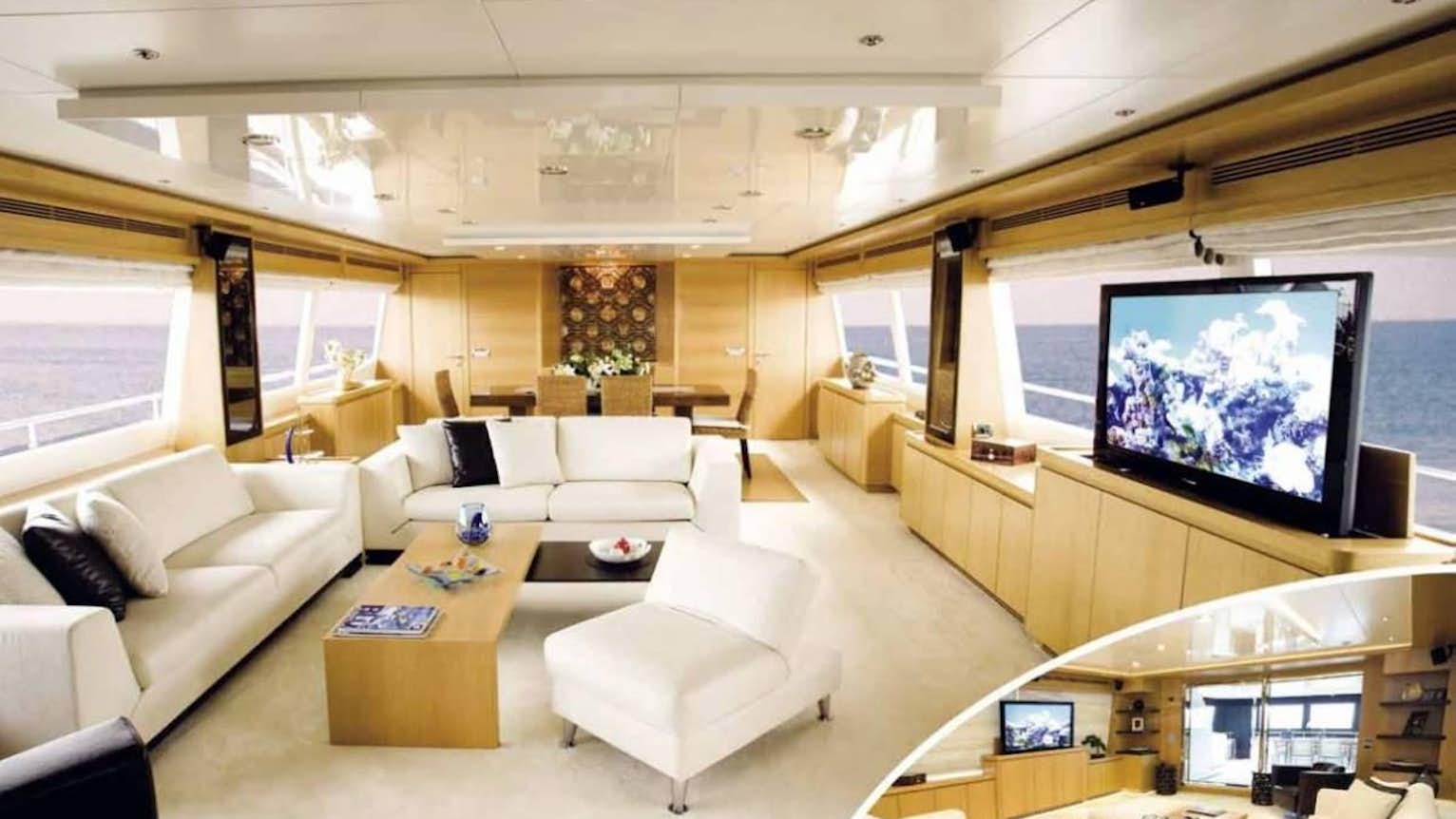 a living room with a large screen aboard PANFELISS Yacht for Charter
