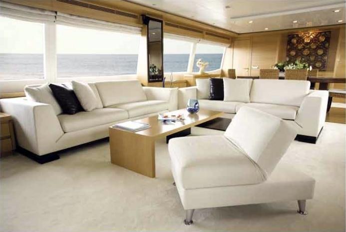 a living room with a couch and a coffee table aboard PANFELISS Yacht for Charter