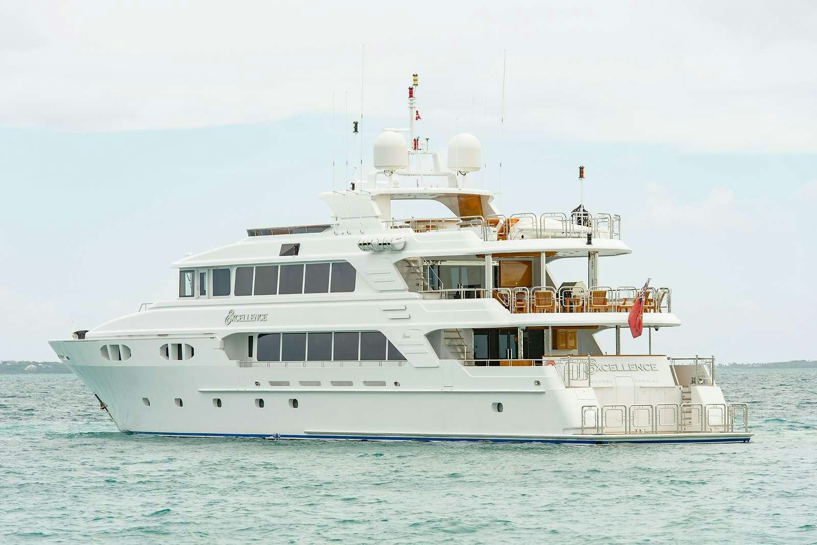 a large white boat in the water aboard EXCELLENCE Yacht for Charter