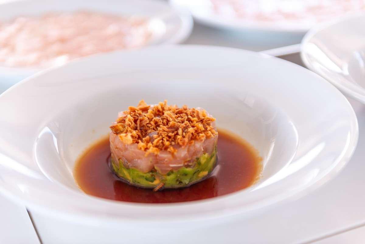 a plate of food aboard SERENISSIMA Yacht for Charter