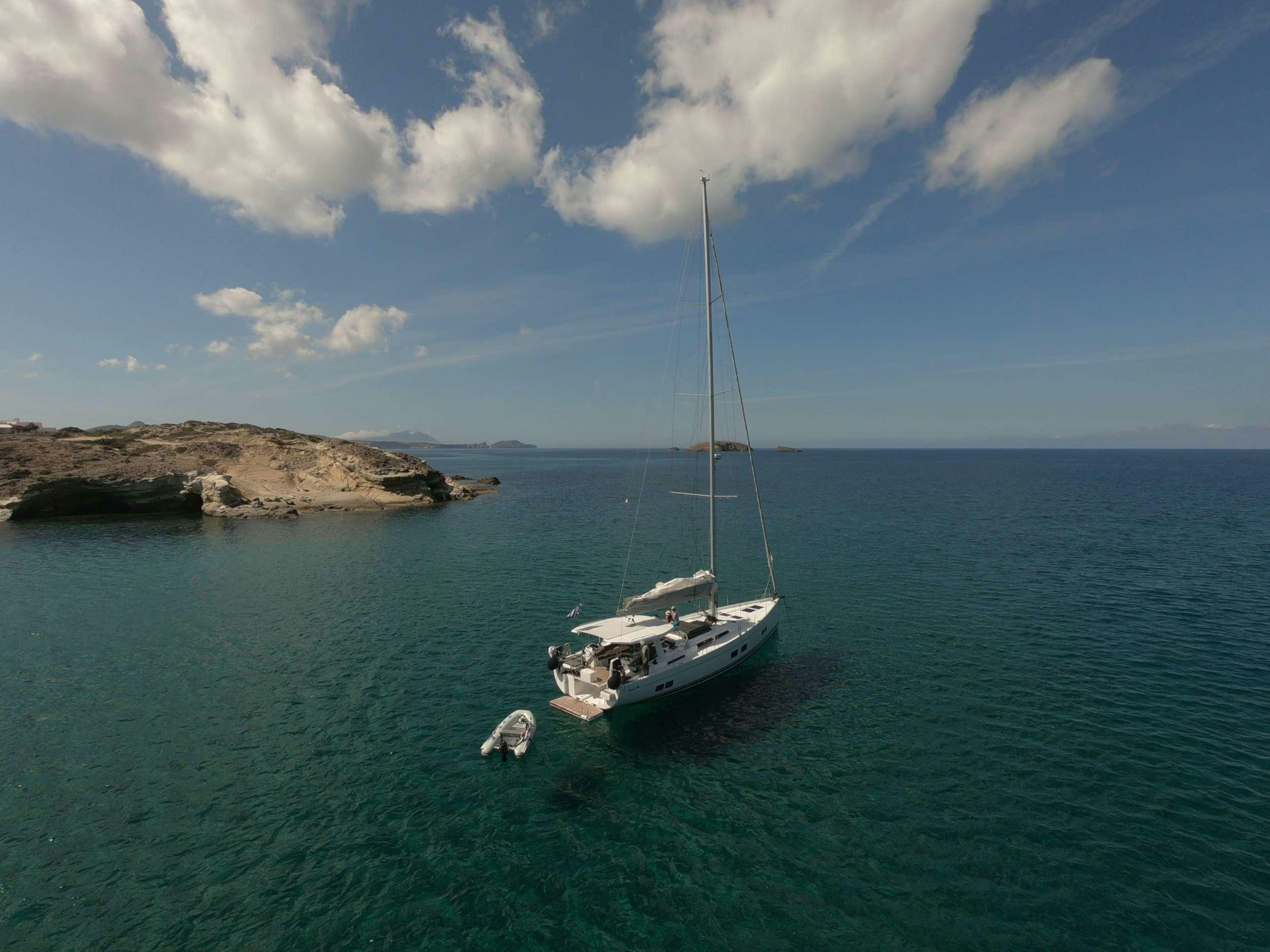 a boat sailing in the sea aboard MED SEA TATION Yacht for Charter