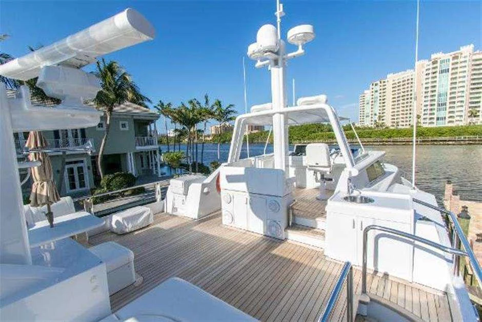 a deck with a deck and a water slide aboard HIGH LINE Yacht for Charter