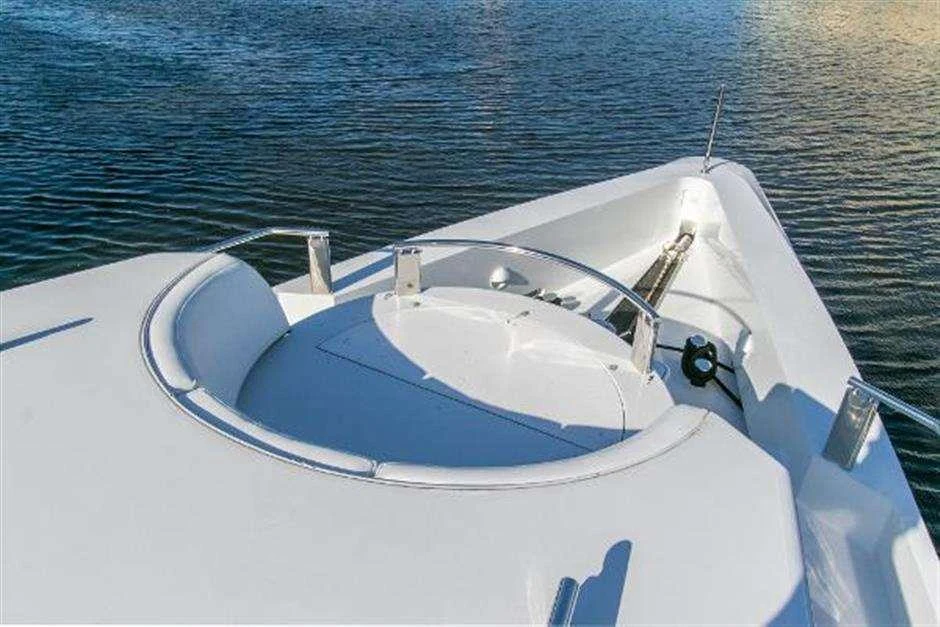 a white boat on the water aboard HIGH LINE Yacht for Charter