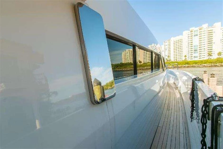 a large glass window with a view of a city aboard HIGH LINE Yacht for Charter