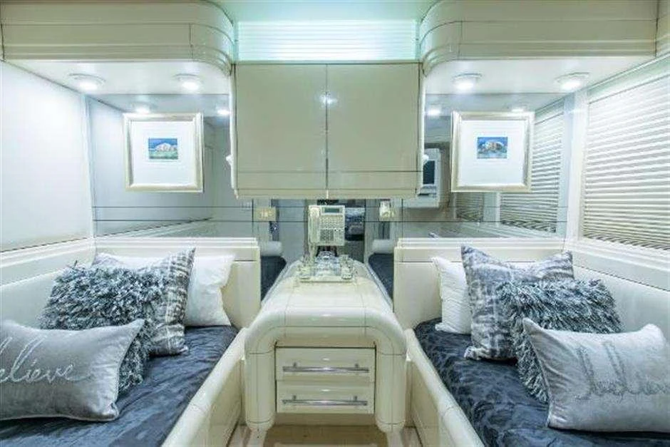 a room with a couple of beds aboard HIGH LINE Yacht for Charter