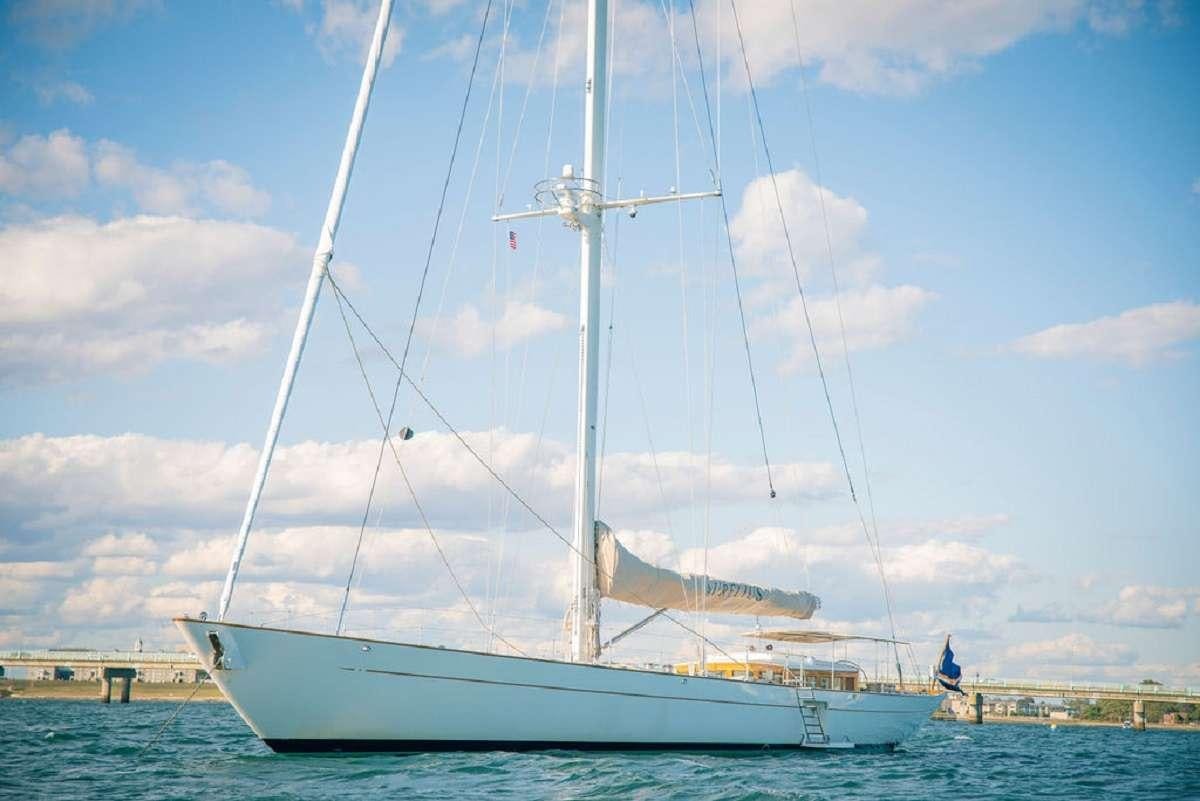 a white boat on the water aboard AURELIUS 111 Yacht for Charter