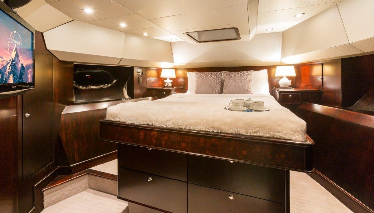 a bed in a hotel room aboard UNBRIDLED Yacht for Charter