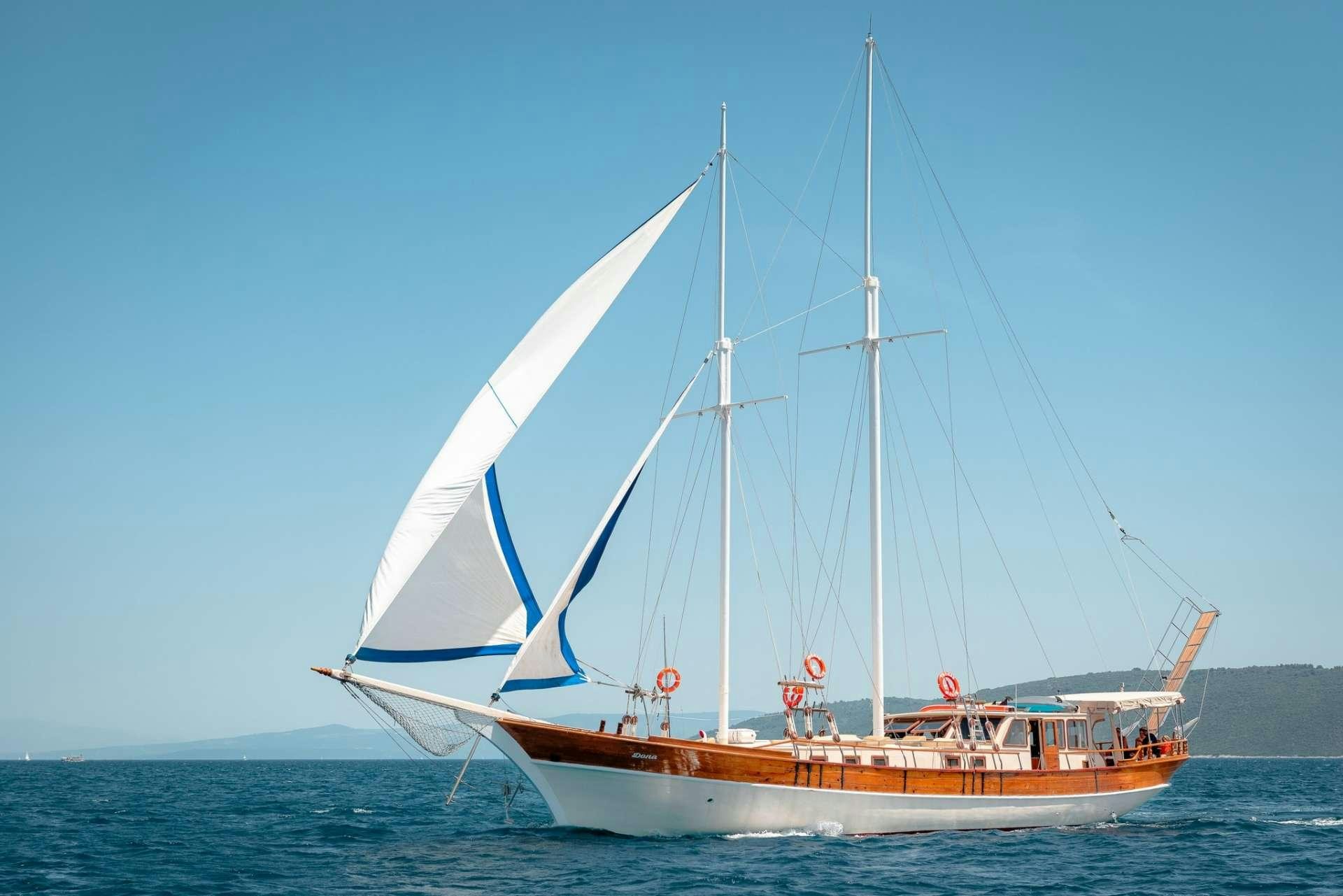 a boat in the water aboard Dona Yacht for Charter