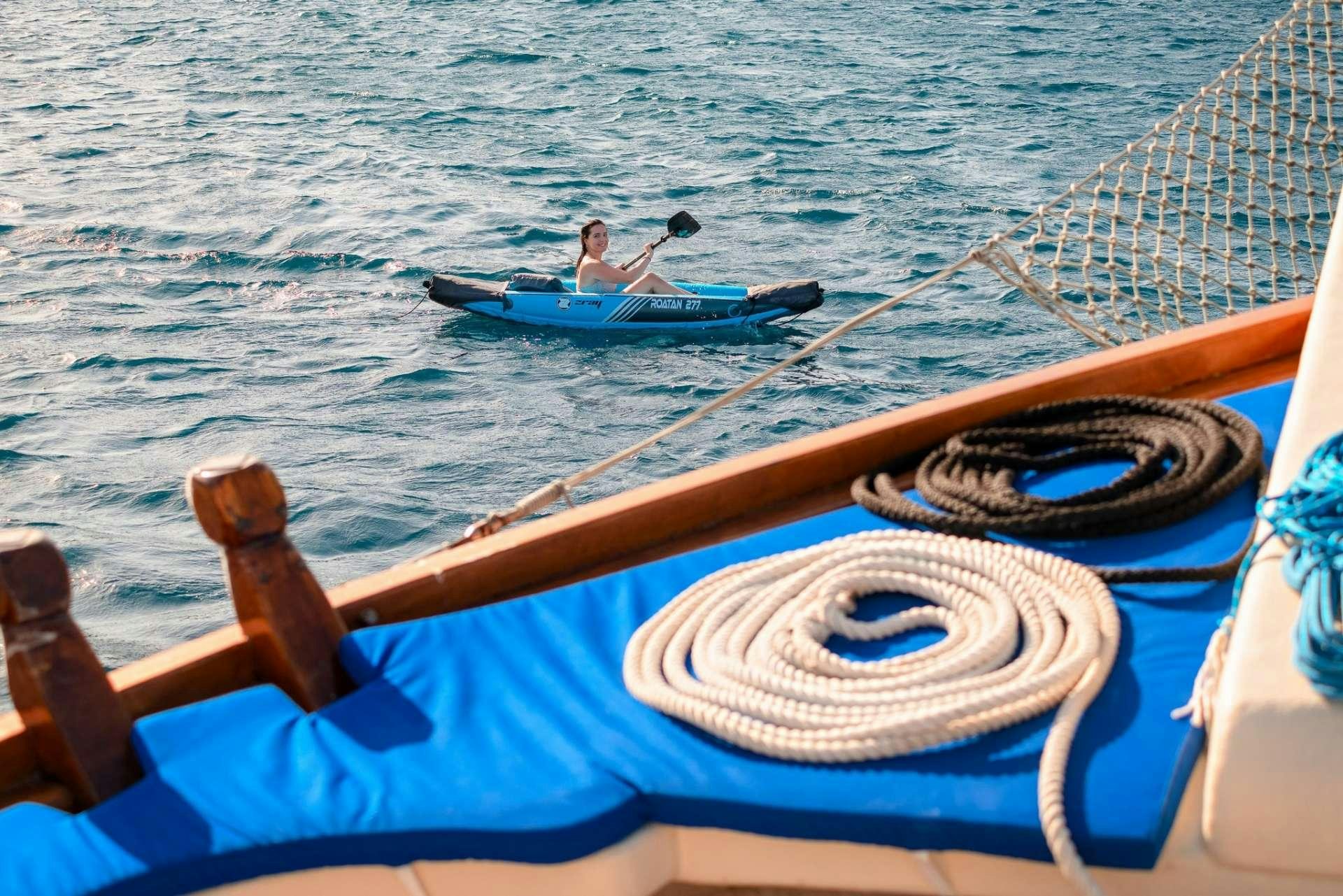 a person in a boat aboard Dona Yacht for Charter