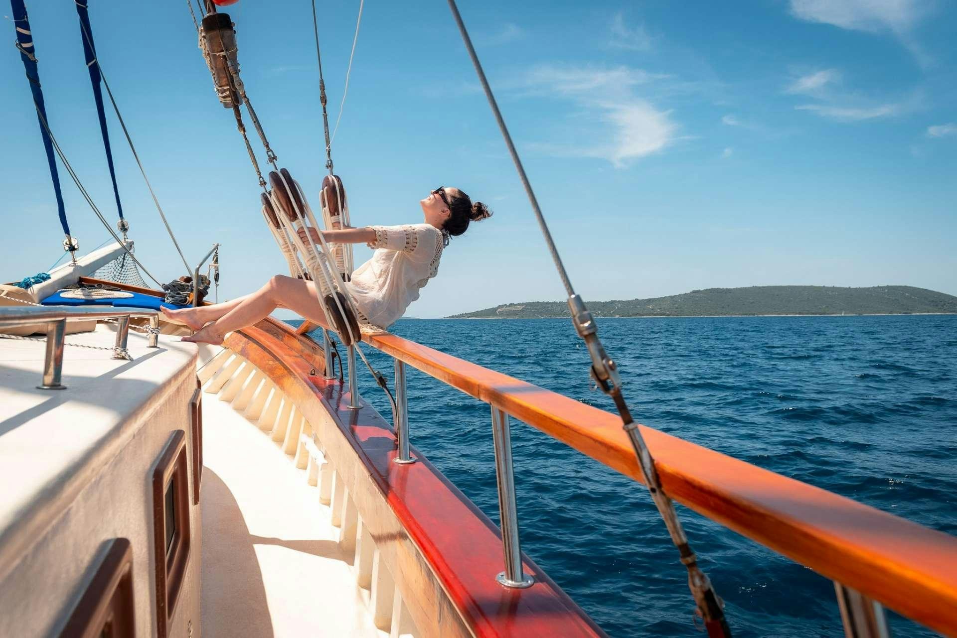 a person on a boat aboard Dona Yacht for Charter