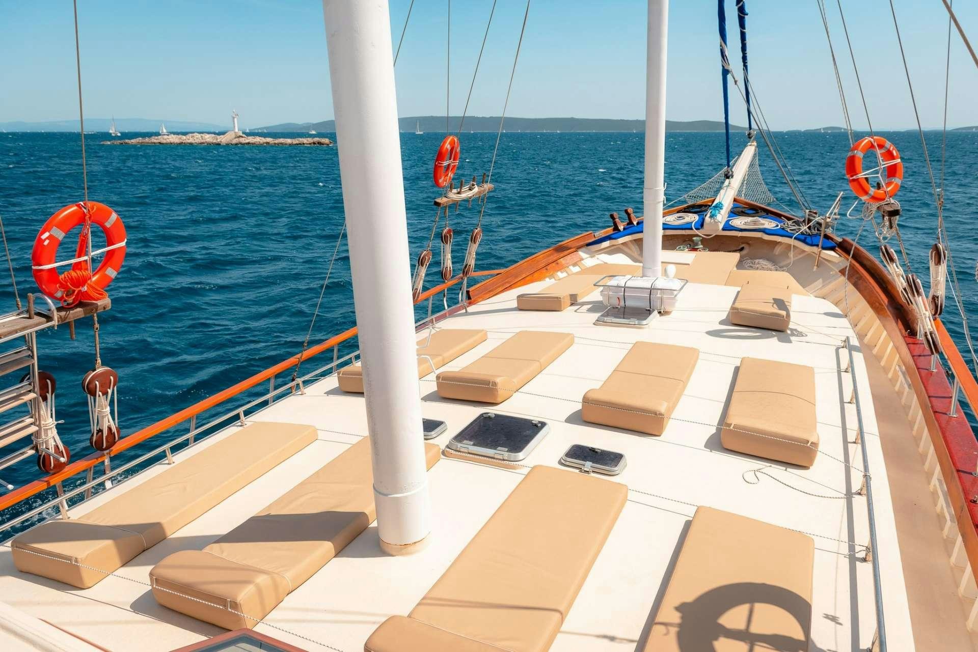 a boat on the water aboard Dona Yacht for Charter