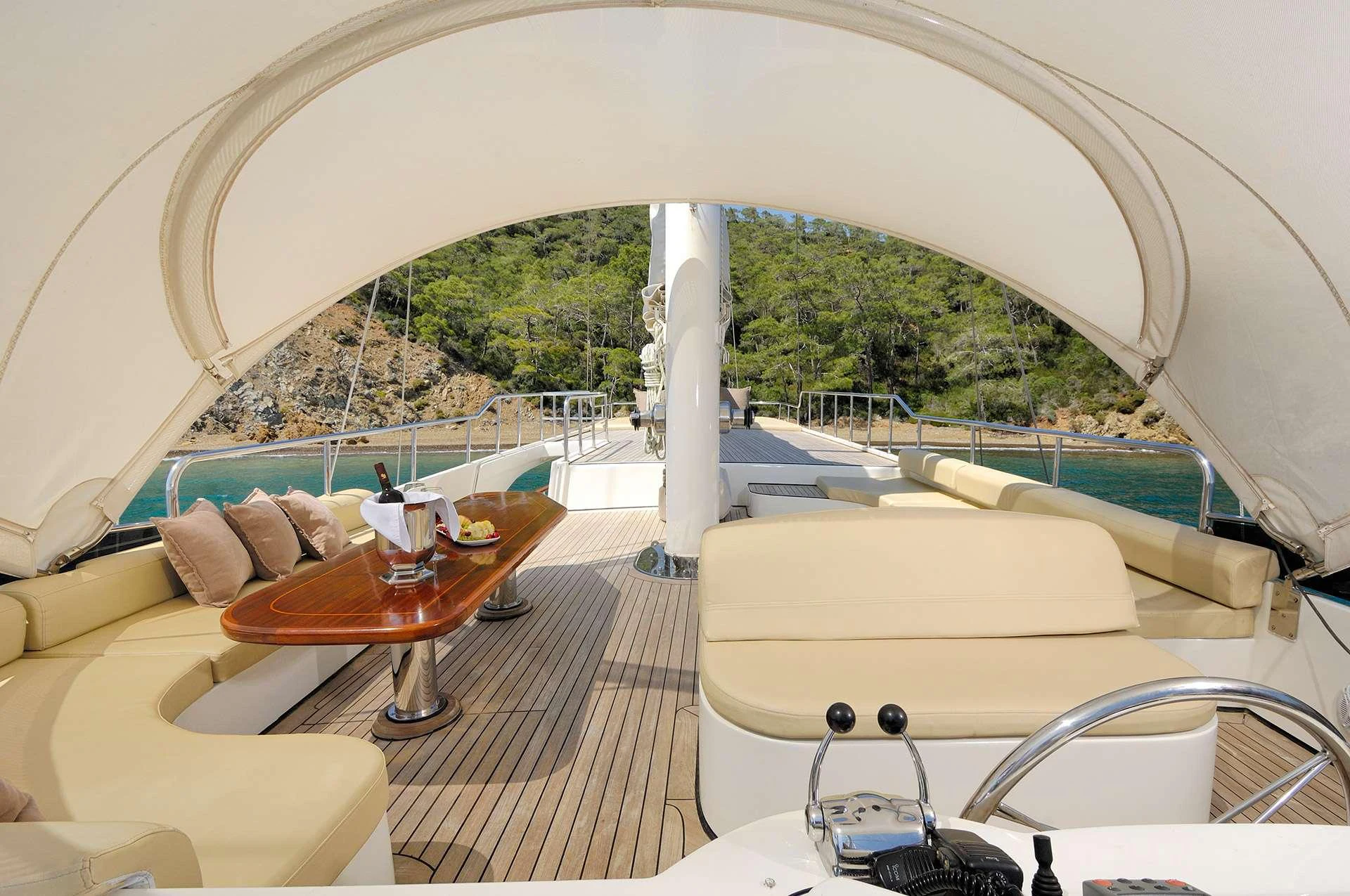 a room with a table and chairs aboard ALESSANDRO I Yacht for Charter
