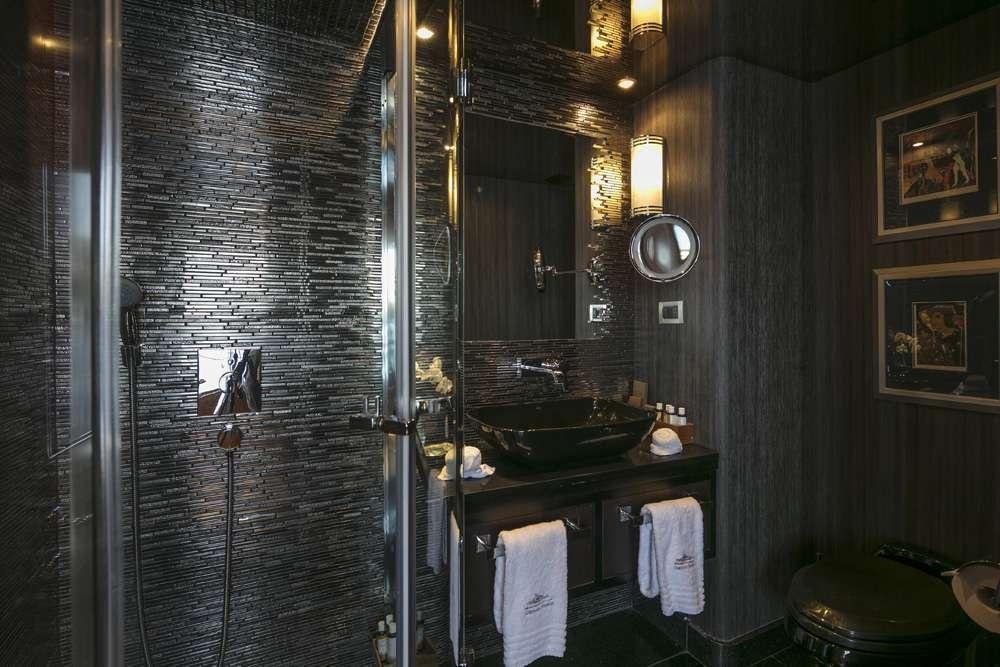 a bathroom with a sink and mirror aboard ENDLESS SUMMER Yacht for Charter