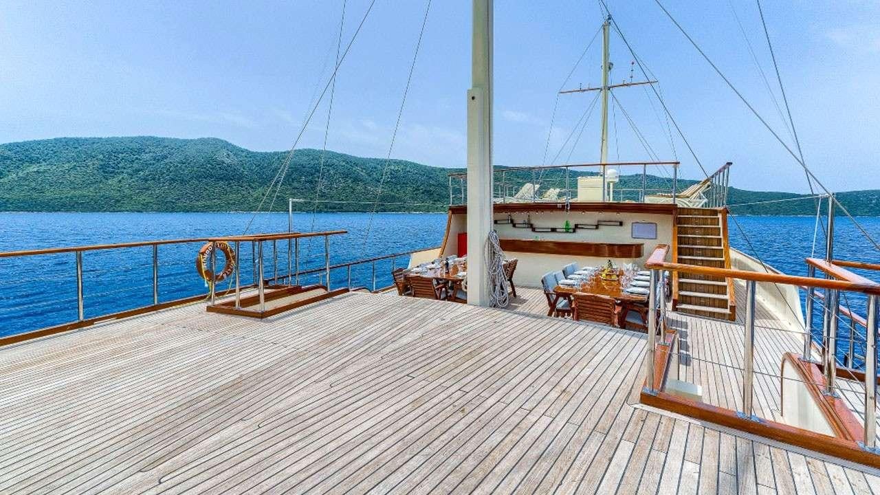 a boat on the water aboard LOVE BOAT Yacht for Charter