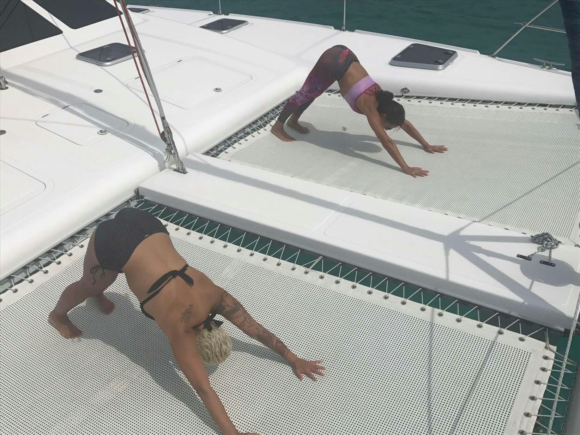 a couple of people in a pool aboard GUINEVERE Yacht for Charter