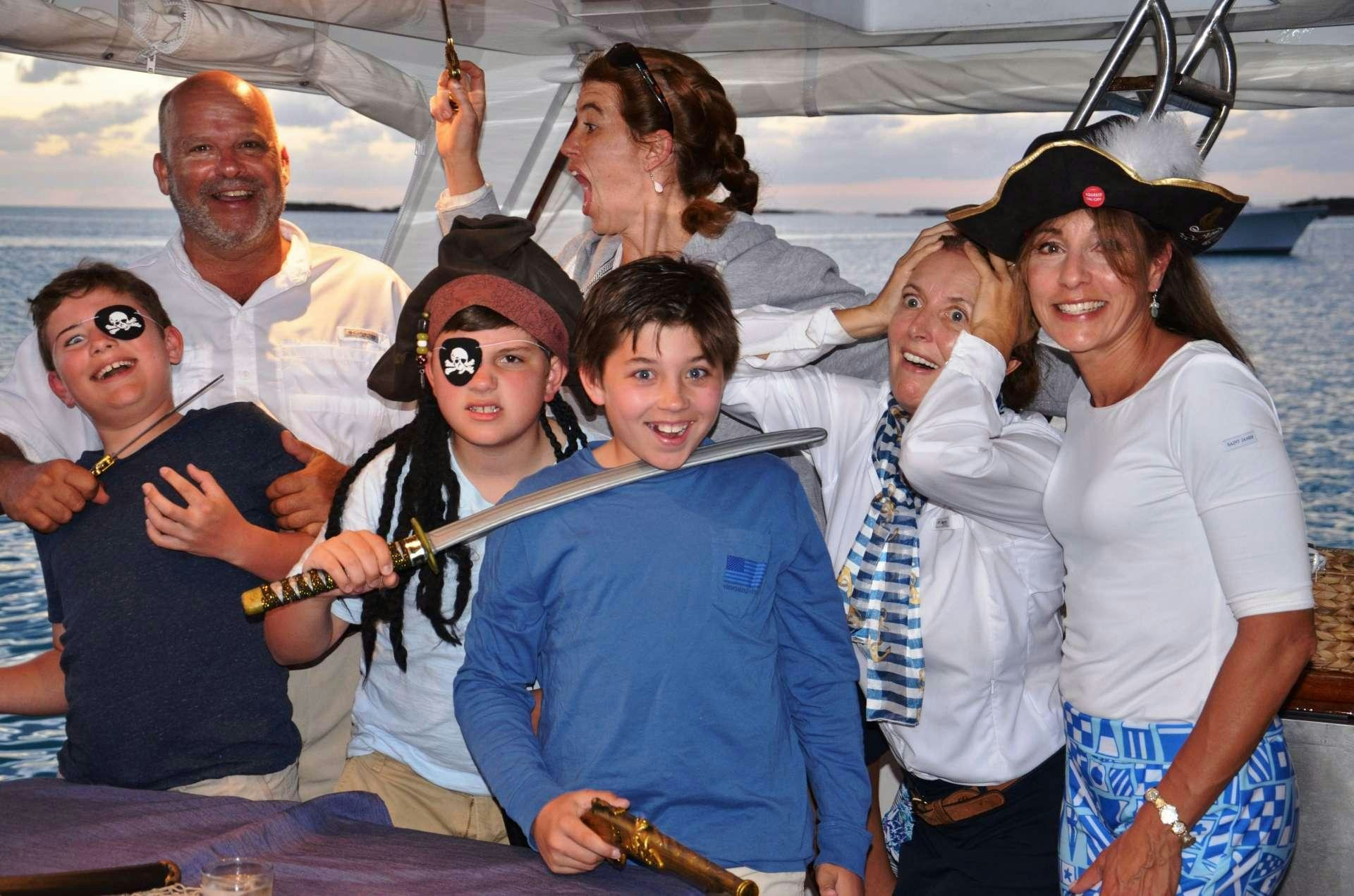 a group of people posing for a photo aboard BONAPARTE Yacht for Charter