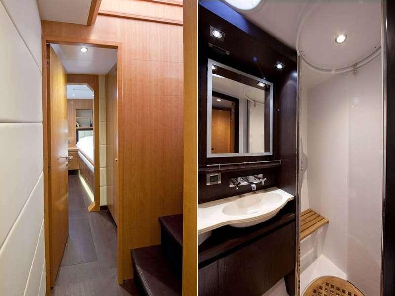 a bathroom with a sink and a mirror aboard MOBY DICK Yacht for Charter
