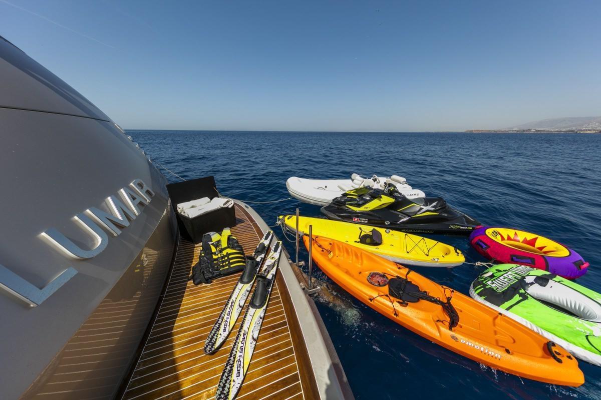 a group of kayaks on a boat aboard XANAX Yacht for Charter