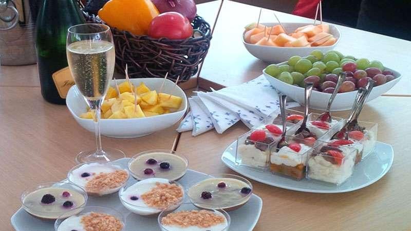 a table full of food aboard SASHA Yacht for Charter