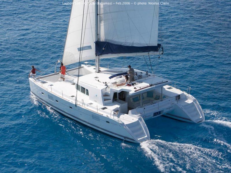 a white boat in the water aboard SASHA Yacht for Charter