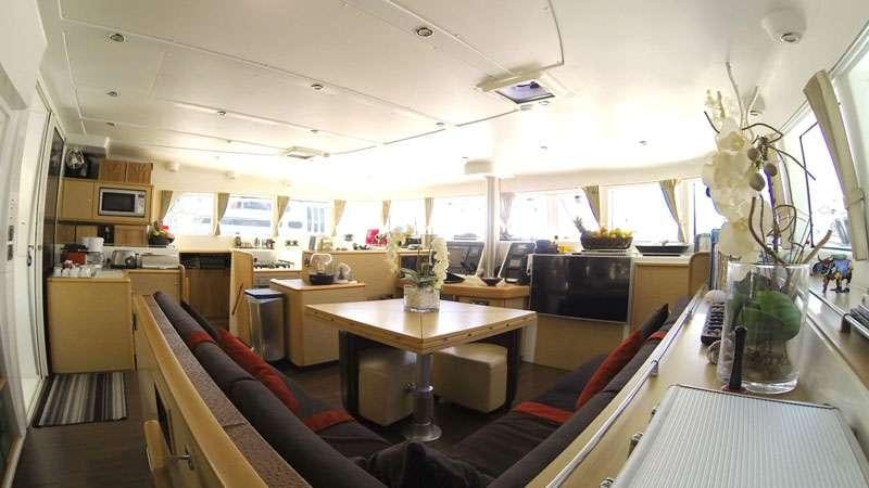 a room with a desk and a computer aboard SASHA Yacht for Charter